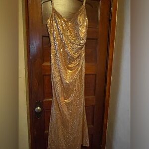 Floor length rose gold dress. Size runs pretty small so size up.